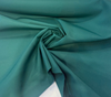 Sunbrella Canvas Forest Green plain weave fabric showing its drape
