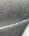Swavelle Denver Stone chenille fabric folded to show the face and backing