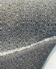 Swavelle Denver Stone chenille fabric folded to show the face and backing