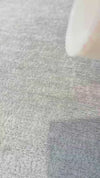 Water beading on Crypton Dawson Grey stain resistant performance chenille, then wiped away