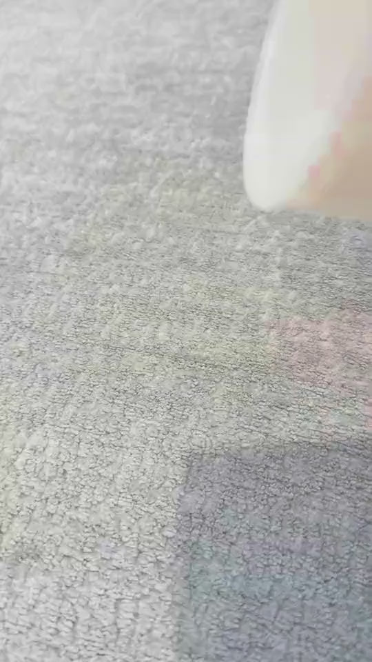 Water beading on Crypton Dawson Grey stain resistant performance chenille, then wiped away