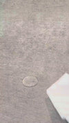 Water beading on Crypton Capri Stone performance velvet, then wiped away