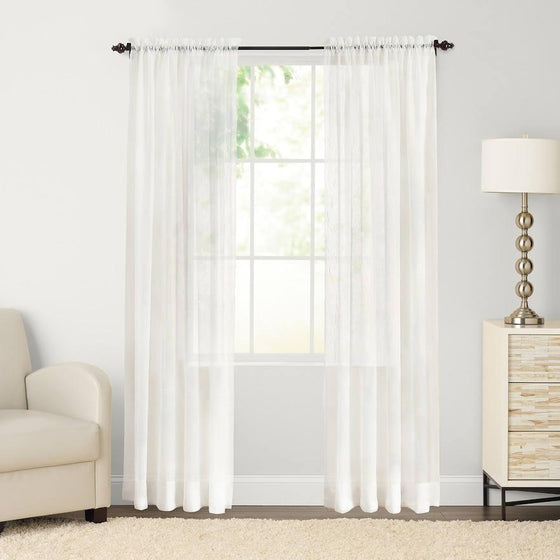 Two white voile curtains hanging on rod in Living room 