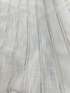 Gold and silver stripe running down white sheet